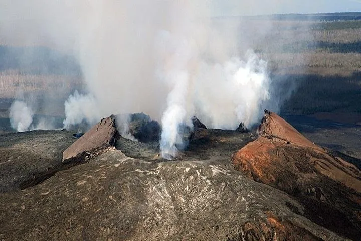 Steam rising from Kilauea caldera in Hawaii Volcanoes National Park on an Oahu volcano tour day trip from Honolulu, Hawaii